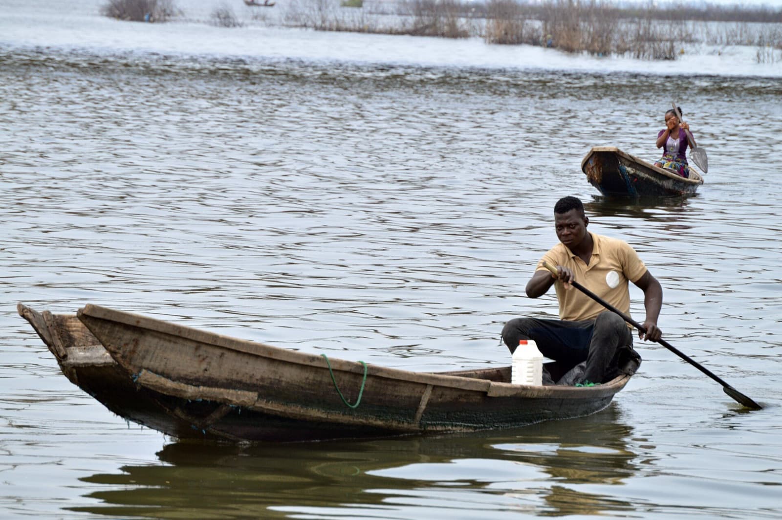 Canoe peddlers on the water in Makoko, Lagos